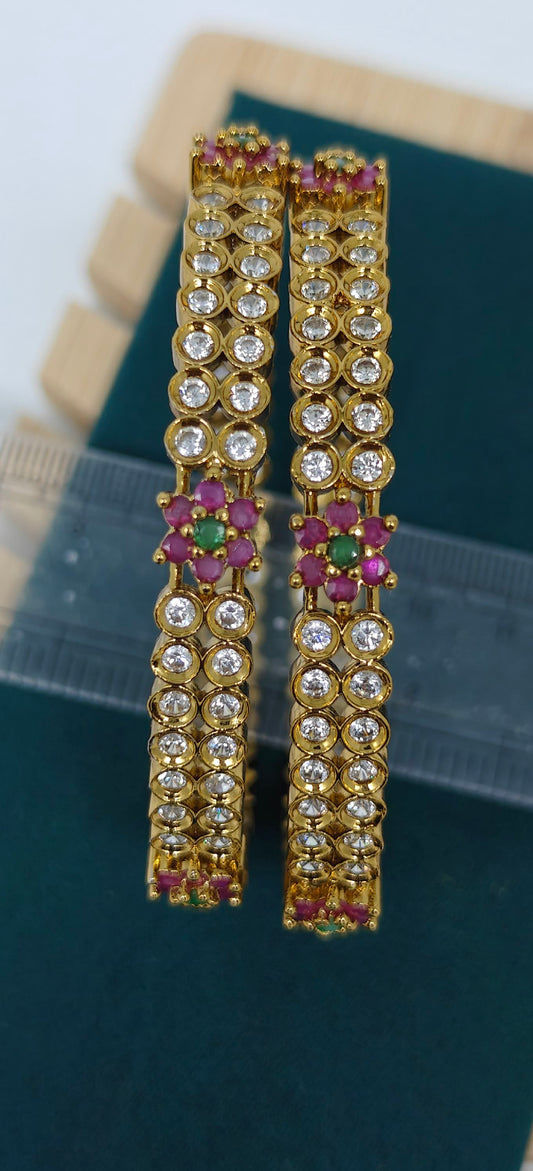 Ad bangles with multi colour stones