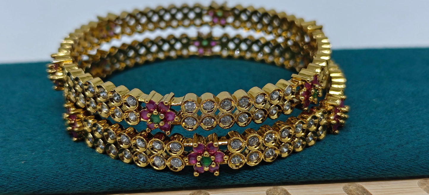 Ad bangles with multi colour stones
